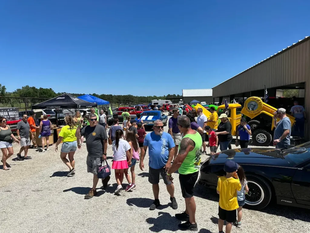 guardian foundation people outside car show